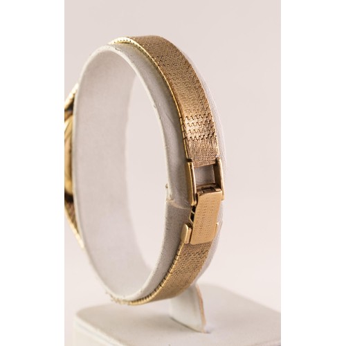 27 - LADY'S ROTARY 9ct GOLD SWISS BRACELET WATCH with 21 jewels movement, silvered oval dial with batons,... 