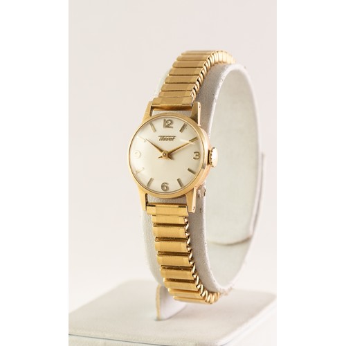 18 - LADY'S TISSOT 14ct GOLD SWISS WRISTWATCH, with mechancial movement, silvered dial with four arabic n... 