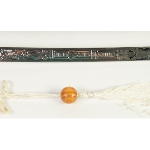 112 - MODERN REPRODUCTION SWORD IN GILT METAL AND SIMULATED LEATHER, the curved clade with United States M... 