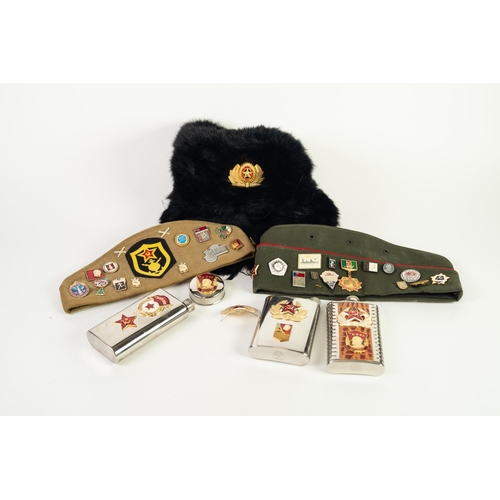 113 - RUSSIAN MILITARY TYPE KHAKI FABRIC FORAGE HAT AND SIMILAR GREEN HAT with red piping applied with app... 