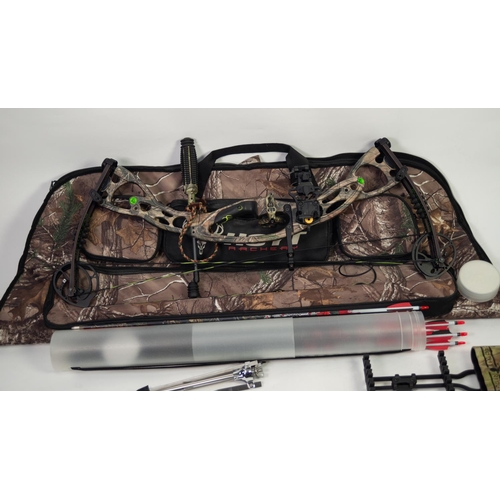 131 - LEFT HANDED HOYT BONE COLLECTOR COLLECTOR’S EDITION COMPOUND BOW, IN CAMO, together with INSTRUCTION... 
