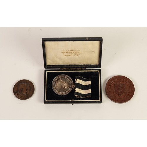 122 - VICTORIA ST JOHNS MEDALLION, inscribed to M.J. Tonge - Whitefield 1926, with black and white ribbon,... 