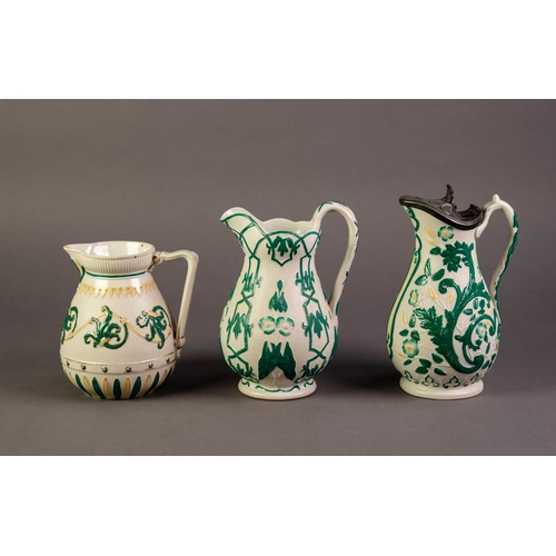 11 - WILLIAM BROWNFIELD OR ATTRIBUTED TO, THREE NINETEENTH CENTURY RELIEF MOULDED POTTERY JUGS, HEIGHTENE... 