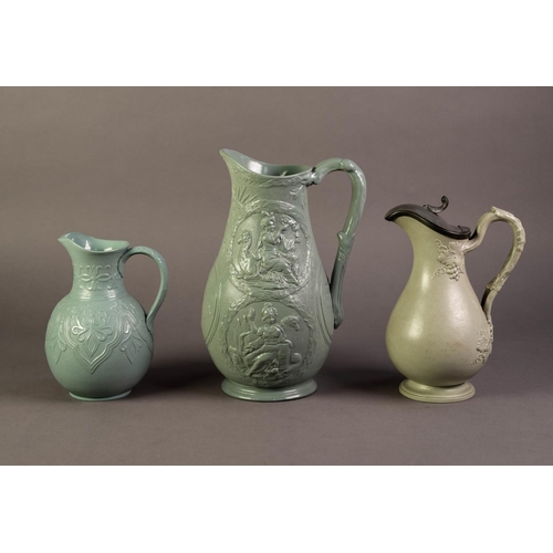 15 - WILLIAM BROWNFIELD OR ATTRIBUTED TO, THREE NINETEENTH CENTURY RELIEF MOULDED POTTERY JUGS IN GREEN, ... 