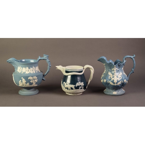 25 - CHRYSANTHEMUM FACTORY, TWO NINETEENTH CENTURY MOULDED POTTERY JUGS AND BLUE AND WHITE, one of footed... 