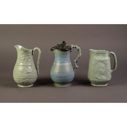 33 - DUDSON OR ATTRIBUTED TO, THREE NINETEENTH CENTURY MOULDED AND GREEN GLAZED POTTERY JUGS, including a... 