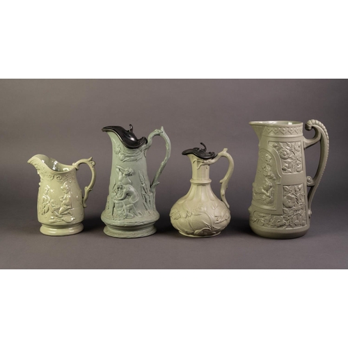 50 - THREE NINETEENTH CENTURY GREEN GLAZED AND RELIEF MOULDED POTTERY JUGS, comprising: ONE ATTRIBUTED TO... 