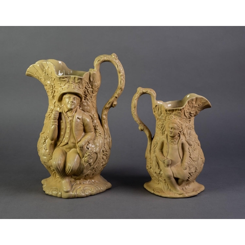 58 - UNATTRIBUTED GRADUATED PAIR OF NINETEENTH CENTURY BUFF GLAZED RELIEF MOULDED POTTERY JUGS, moulded w... 