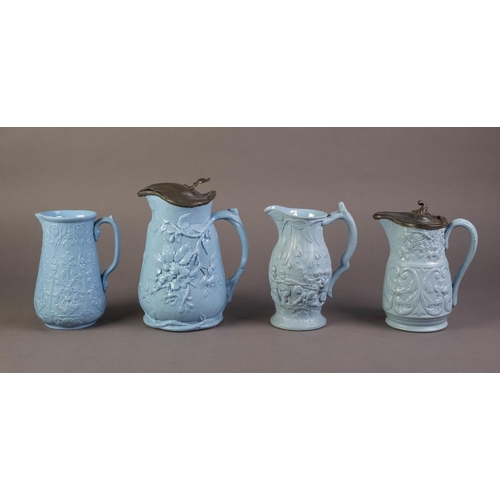 62 - FOUR UNATTRIBUTED NINETEENTH CENTURY BLUE GLAZED AND RELIEF MOULDED POTTERY JUG, comprising: A LIDDE... 