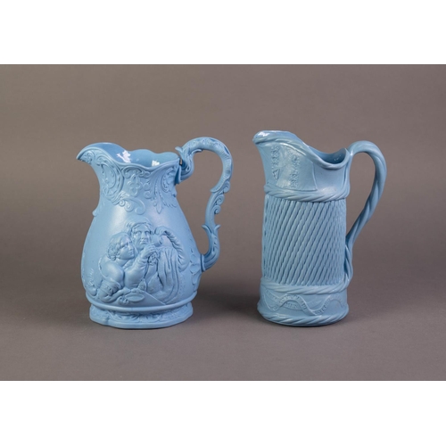 67 - TWO UNATTRIBUTED NINETEENTH CENTURY BLUE GLAZED AND RELIEF MOULDED POTTERY JUGS, one PRODUCED TO COM... 