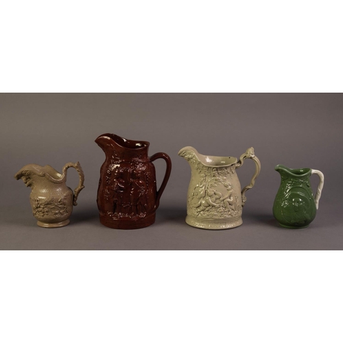 72 - FOUR UNATTRIBUTED NINETEENTH CENTURY RELIEF MOULDED JUGS IN COLOURED GLAZES, comprising: ONE IN REDD... 