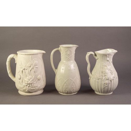 76 - THREE UNATTRIBUTED NINETEENTH CENTURY WHITE GLAZED POTTERY JUGS RELIEF MOULDED WITH FLOWERS, includi... 