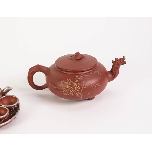 252 - A CHINESE REPUBLIC PERIOD YIXING RED EARTHENWARE WHITE METAL APPLIED MINIATURE RICE-WINE SET, compri... 