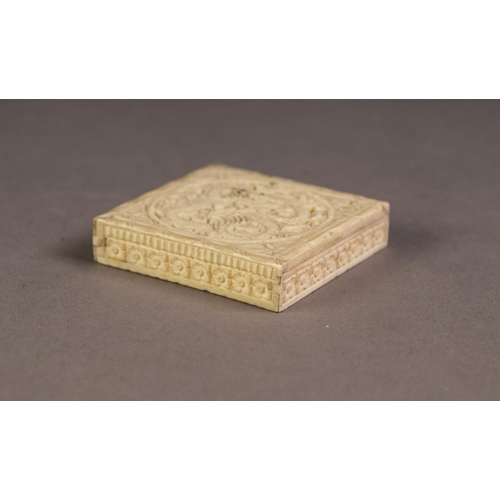 233 - EARLY 20th CENTURY CHINESE IVORY SHALLOW BOX, the slide top pierced and carved with a wrything drago... 