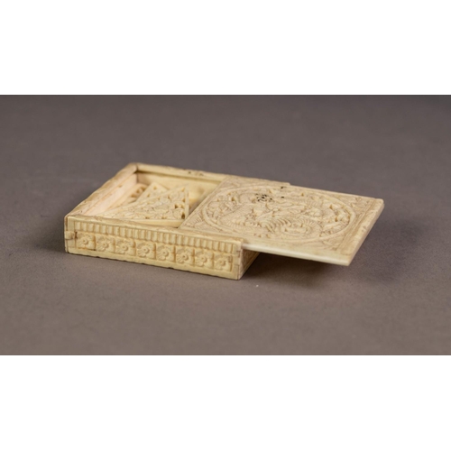 233 - EARLY 20th CENTURY CHINESE IVORY SHALLOW BOX, the slide top pierced and carved with a wrything drago... 