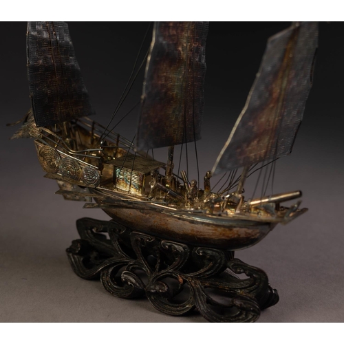 195 - CHINESE SILVER PLATED MODEL OF A THREE-MASTED FIGHTING JUNK with figures, canons, ten oars, numerous... 