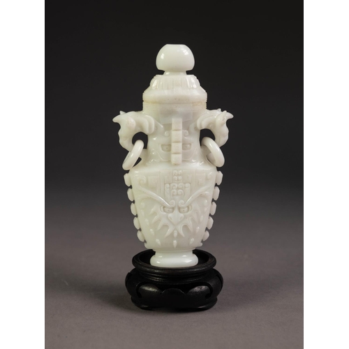 214 - CHINESE CARVED WHITE JADE VASE AND COVER of flattened shaped, domed cover with bud finial, two anima... 