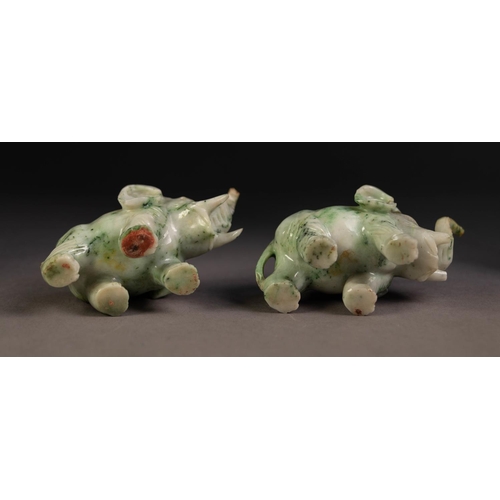 218 - PAIR OF CHINESE CARVED SPECKLED GREY/GREEN MODELS OF ELEPHANTS, with trunks raised, 2 1/4in (5.75cm)... 