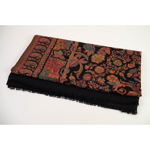 70 - WOVEN SILK AND WOOL PAISLEY SHAWL, the central ground filled with naturalistic flowers and scrolls o... 