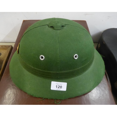 120 - MODERN GREEN FABRIC COVERED PITH HELMET, with GILT AND RED ENAMELLED BADGE, possibly Chinese?