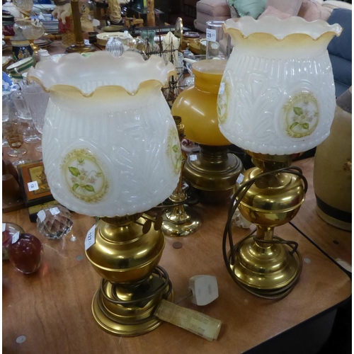 127 - A PAIR OF BRASS OIL TABLE LAMPS WITH WHITE OPAQUE MOULDED GLASS SHADES WITH FRILL TOP AND A COPPER A... 