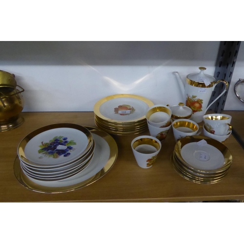 133 - A COMPOSITE 29 PIECE BAVARIAN AND CZECHOSLOVAKIAN GOLD BORDERED AND FRUIT PRINTED TEA SERVICE
