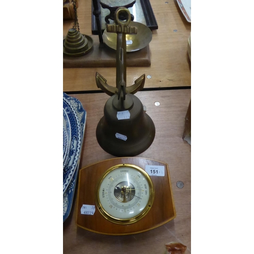 151 - A SMALL ANEROID WALL BAROMETER AND A LARGE WALL MOUNTED BRASS SHIP’S BELL (2)