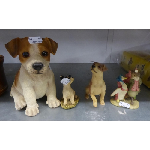 40 - A LARGE COMPOSITION MODEL OF A SEATED DOG; TWO SMALL RESIN MODELS OF DOGS AND A BEATRIX POTTER GROUP... 