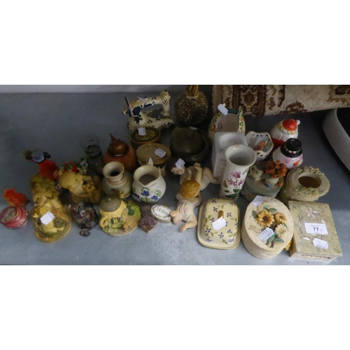 77 - SUNDRY CERAMICS AND RESIN ORNAMENTS INCLUDING; A PAIR OF TINTED BISQUE PIANO BABIES