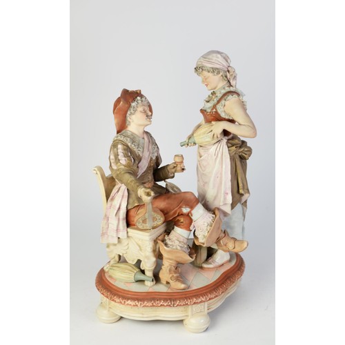 101A - AN EARLY 1900's GERMAN BISQUE PORCELAIN FIGURAL GROUP of a seated cavalier  with serving maid, impre... 