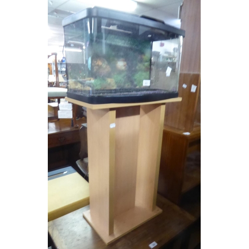 311 - A FISH TANK, ON MODERN BLOND WOOD STAND