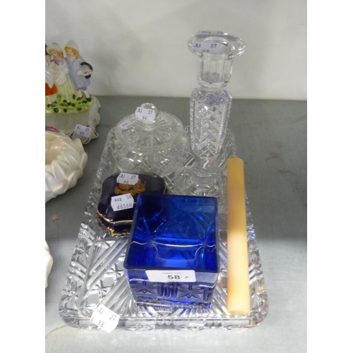 58 - CUT GLASS OBLONG DRESSING TABLE TRAY, CANDLESTICK AND POWDER BOWL WITH COVER AND A BLUE GLASS CUBE S... 