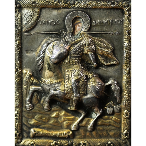 301 - TWENTIETH CENTURY BYZANTINE SILVER RELIEF AND PAINTED ICON of a saintly warrior on rearing horse, 3 ... 