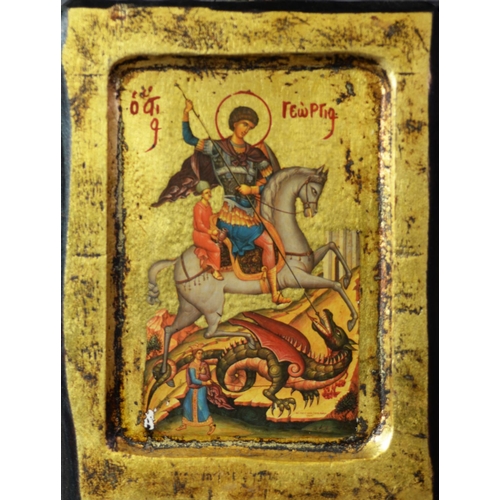 301 - TWENTIETH CENTURY BYZANTINE SILVER RELIEF AND PAINTED ICON of a saintly warrior on rearing horse, 3 ... 