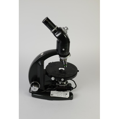 69 - VICKERS M70/1/193 MONOCULAR POLARIZING MICROSCOPE with two objective lenses fitted, 15 1/2