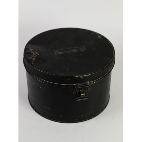 328 - BLACK JAPANNED METAL WIG TIN OR HAT TIN, drum shaped, with simple hoop fastening, 10 1/2in (26.7cm) ... 