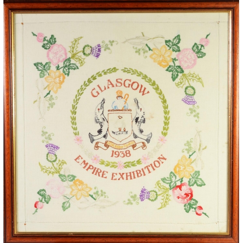 218 - NEEDLEWORK SAMPLER GLASGOW EMPIRE EXHIBITION 1938, centred with a representation of the coat of arms... 