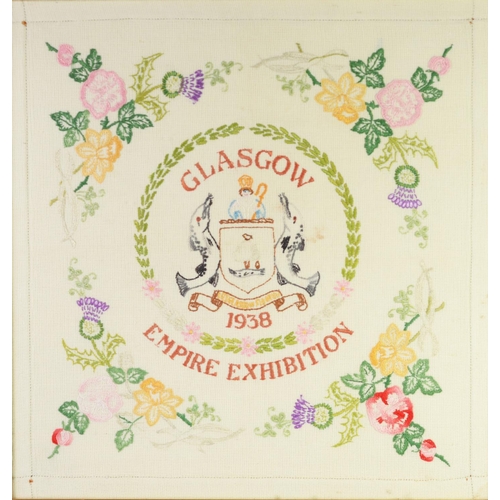 218 - NEEDLEWORK SAMPLER GLASGOW EMPIRE EXHIBITION 1938, centred with a representation of the coat of arms... 