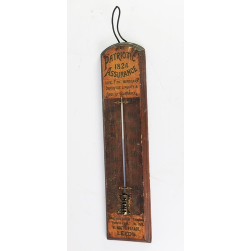 241 - ‘PATRIOTIC ASSURANCE’ WALL MOUNTED STAINED FRUITWOOD THERMOMETER, 21” (53.3cm) high