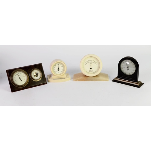 61 - FOUR EARLY TWENTIETH CENTURY DESK BAROMETERS IN BAKELITE CASES, including a ROTOTHERM EXAMPLE with a... 