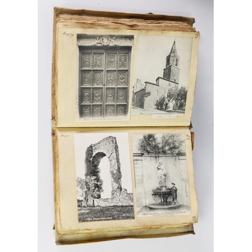 93 - LADY'S VELLUM COVERED JOURNAL OF TRAVELS ABROAD ILLUSTRATED WITH POSTCARDS stuck in and dated on the... 