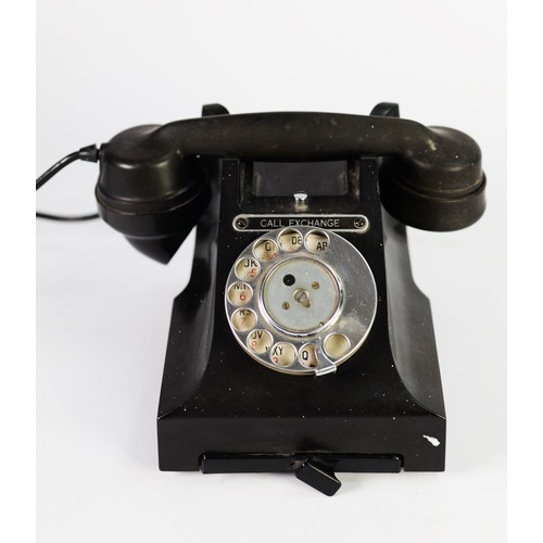 344 - VINTAGE BLACK CRADLE TELEPHONE with 'Call Exchange' label above the dial, small pull-out slide to fr... 