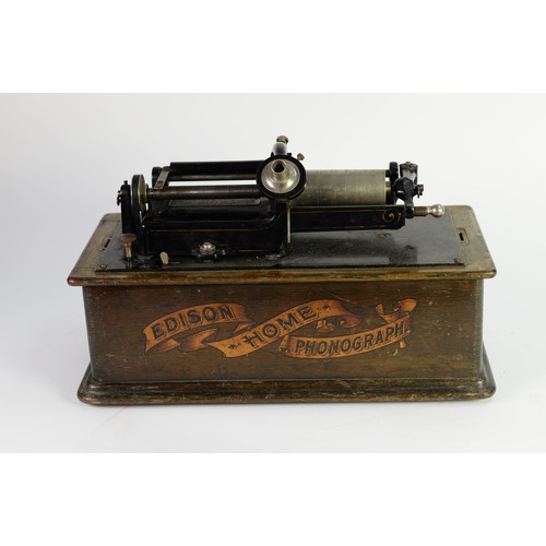 345 - THE EDISON HOME PHONOGRAPH, of typical form black japanned and bright metal with stained wood base a... 