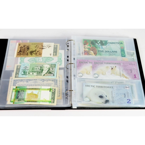 20 - RING BINDER CONTAINING A GOOD SELECTION OF WORLD BANK NOTES, late 20th Century to early 21st Century... 