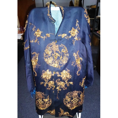 357 - CHINESE HAORI OR SHORT JACKET WORN OVER KIMONO -  principally midnight blue silk embroidered in gold... 