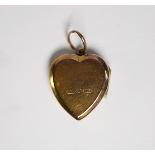 411 - SMALL HEART SHAPED LOCKET PENDANT, the front with a tiny diamond, in star shaped setting, (engraved ... 