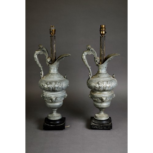 318 - PAIR OF EARLY TWENTIETH CENTURY CLASSICAL EWER FORM CAST WHITE METAL TABLE LAMPS, formerly electropl... 