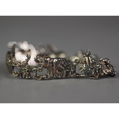 394 - SILVER AND MARCASITE NOAH’S ARK BRACELET with seven animal links and a narrow silver and marcasite B... 