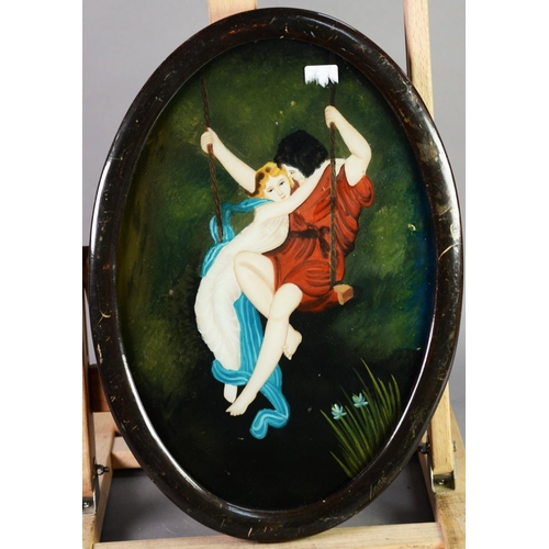 296 - PRE-WAR OVAL REVERSE PAINTED ON GLASS PICTURE, COUPLE IN CLASSICAL COSTUME, embracing whilst on a sw... 