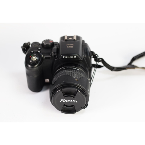 Valkuilen jam de elite FUJIFILM FINEPIX S9600 DIGITAL CAMERA with Fujivision zoom lens, 10.7x  optical f=6.2 - 66.7mm 1:2.8